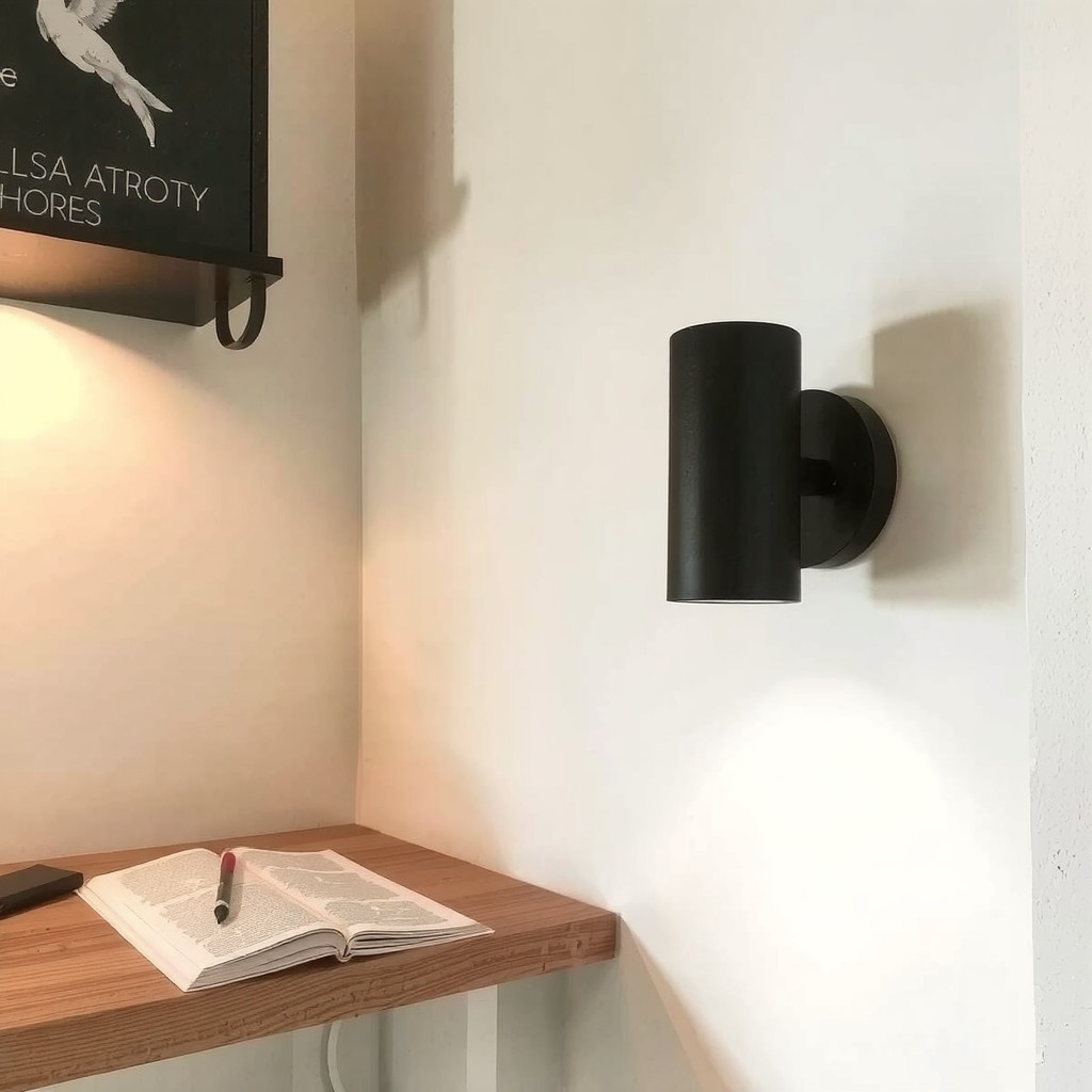 A cozy reading nook with sconce