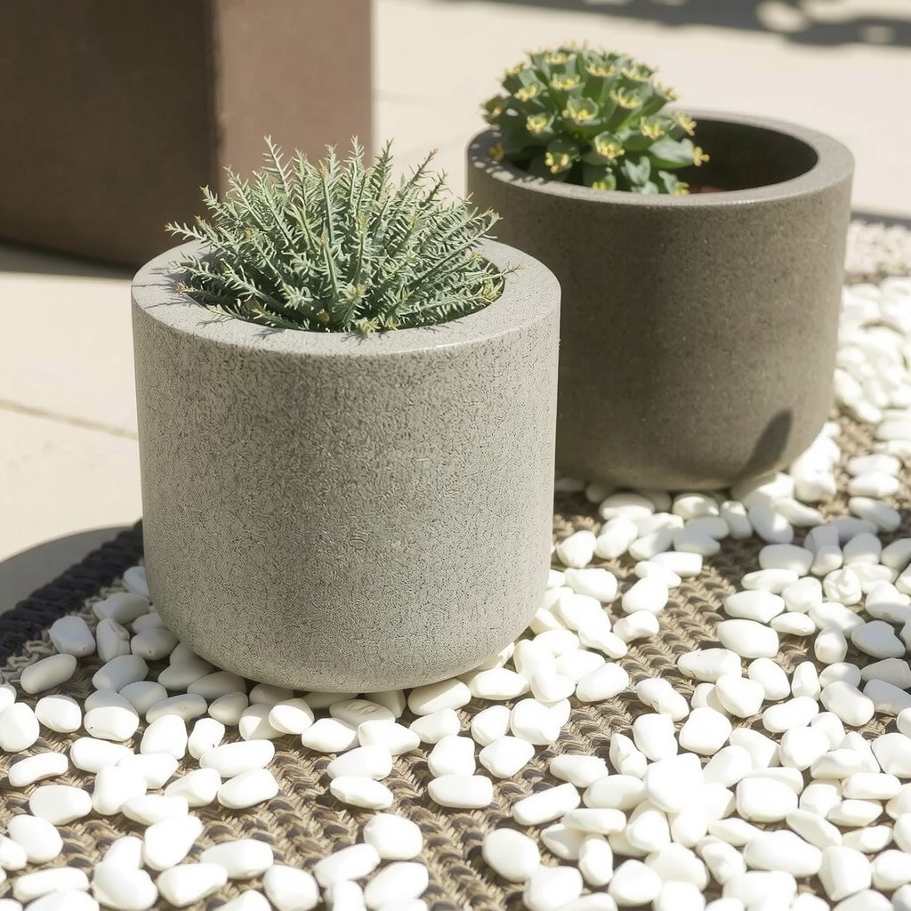 Textured concrete planters on a geometric outdoor rug